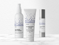 Rulo skincare products displayed on a marble surface, including Afterbath Moisturizer spray,  Eczema Relief Lotion, and Calming Hydration Serum, in minimalist white packaging with blue dotted design.